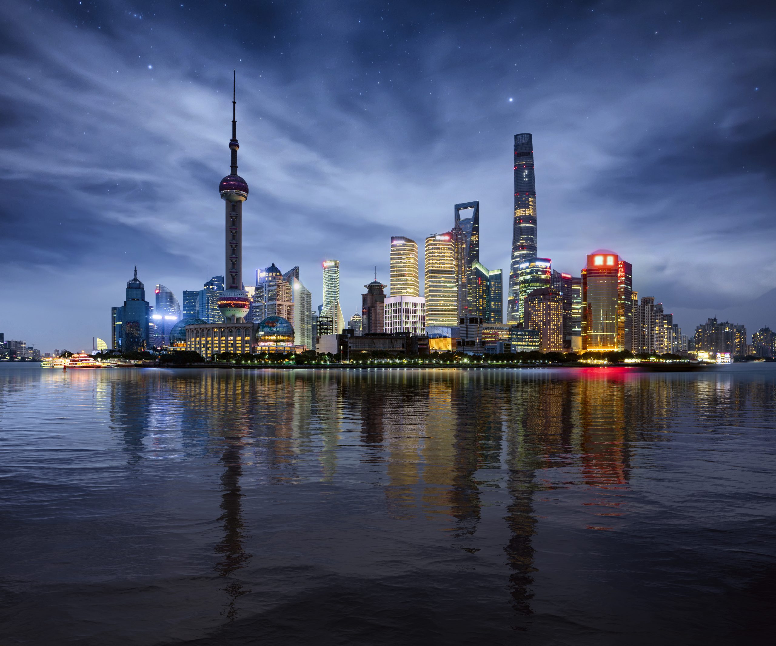 Night Cityscape of Shanghai, China city skyline on the Huangpu River.